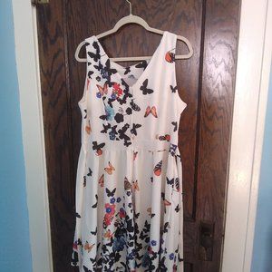 Brand name Owin. XL white with multi color flowers and butterflies.